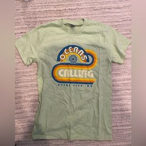 Oceans Calling music festival t shirt size unisex small. Never worn.